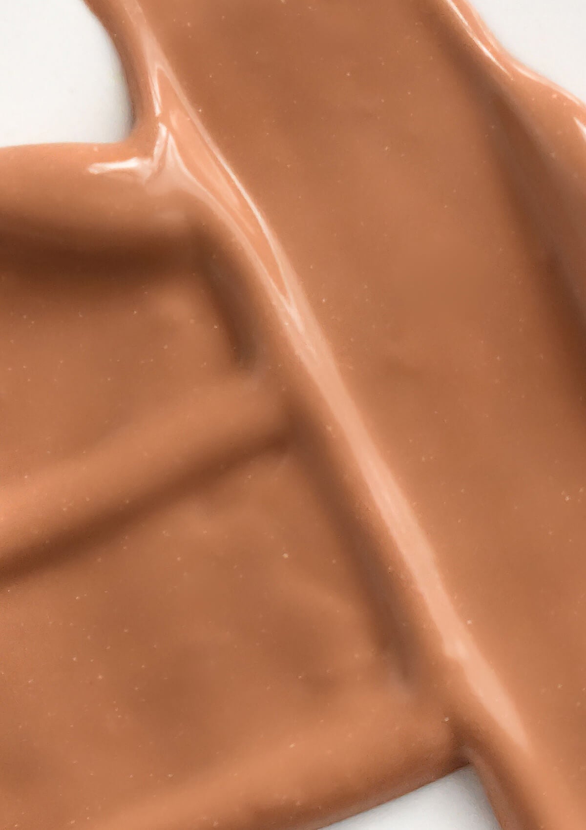Textur der getönten Tagescreme