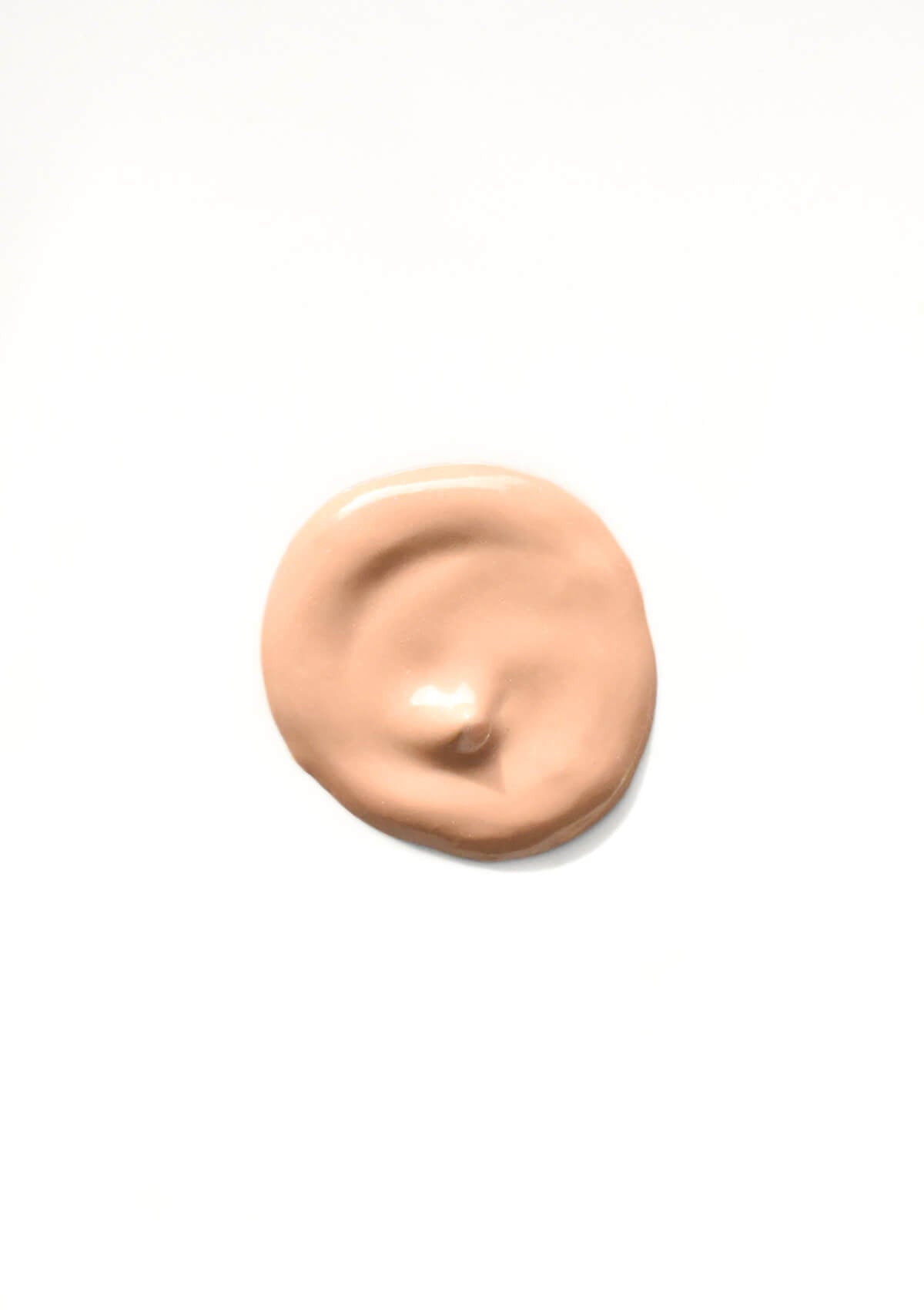 Runder Textur Klecks des Concealers in einem hellen Ton
