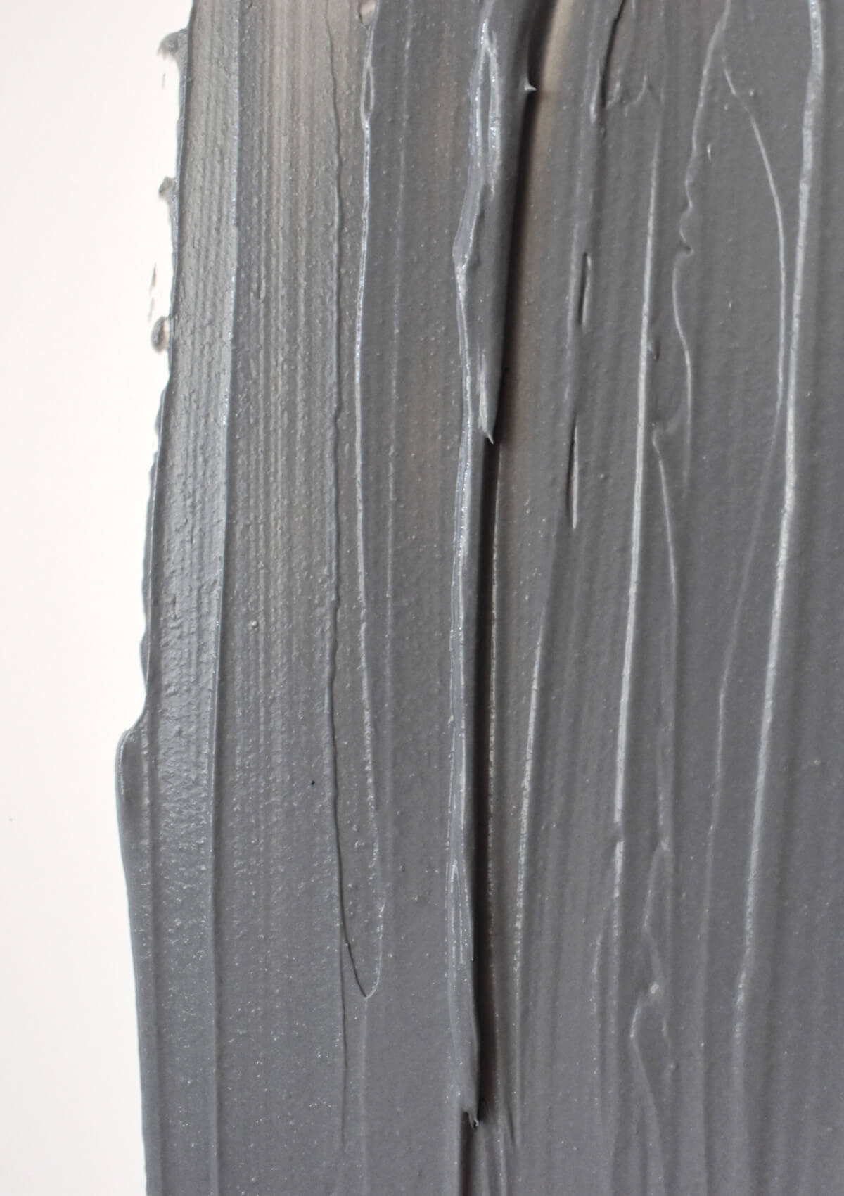 graue Textur der Charcoal Clay Mask